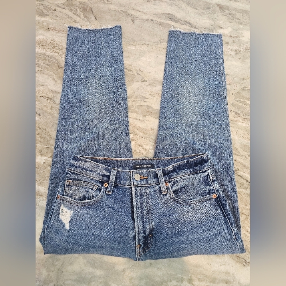 Lucky Brand Relaxed Taper Jeans Women’s 0/25 Medium Wash Raw Hem Distressed Deni